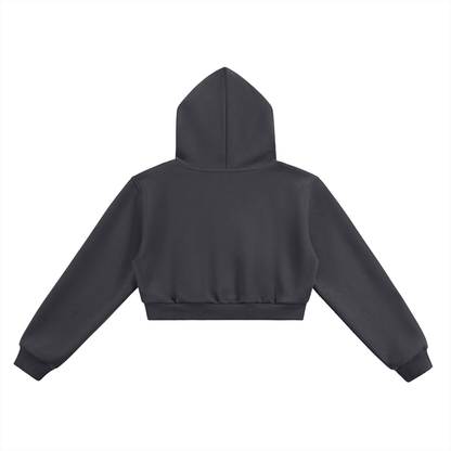 Black cropped hoodie with hood, long sleeves, and ribbed hem — urban streetwear style