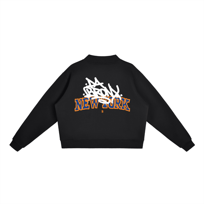 Black cropped hoodie with Bronx graffiti art and bold New York lettering, NYC streetwear style