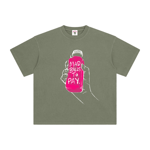 Green t-shirt with a graphic of a hand holding a pink bottle labeled 'Mad Bills to Pay' on a white background.